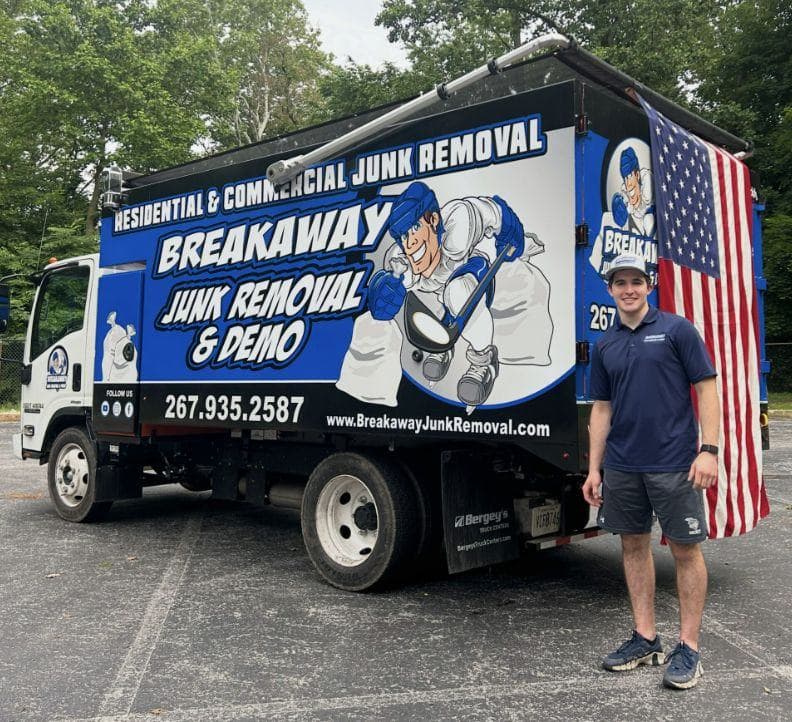 A Breakaway crew member beside the Breakaway box truck